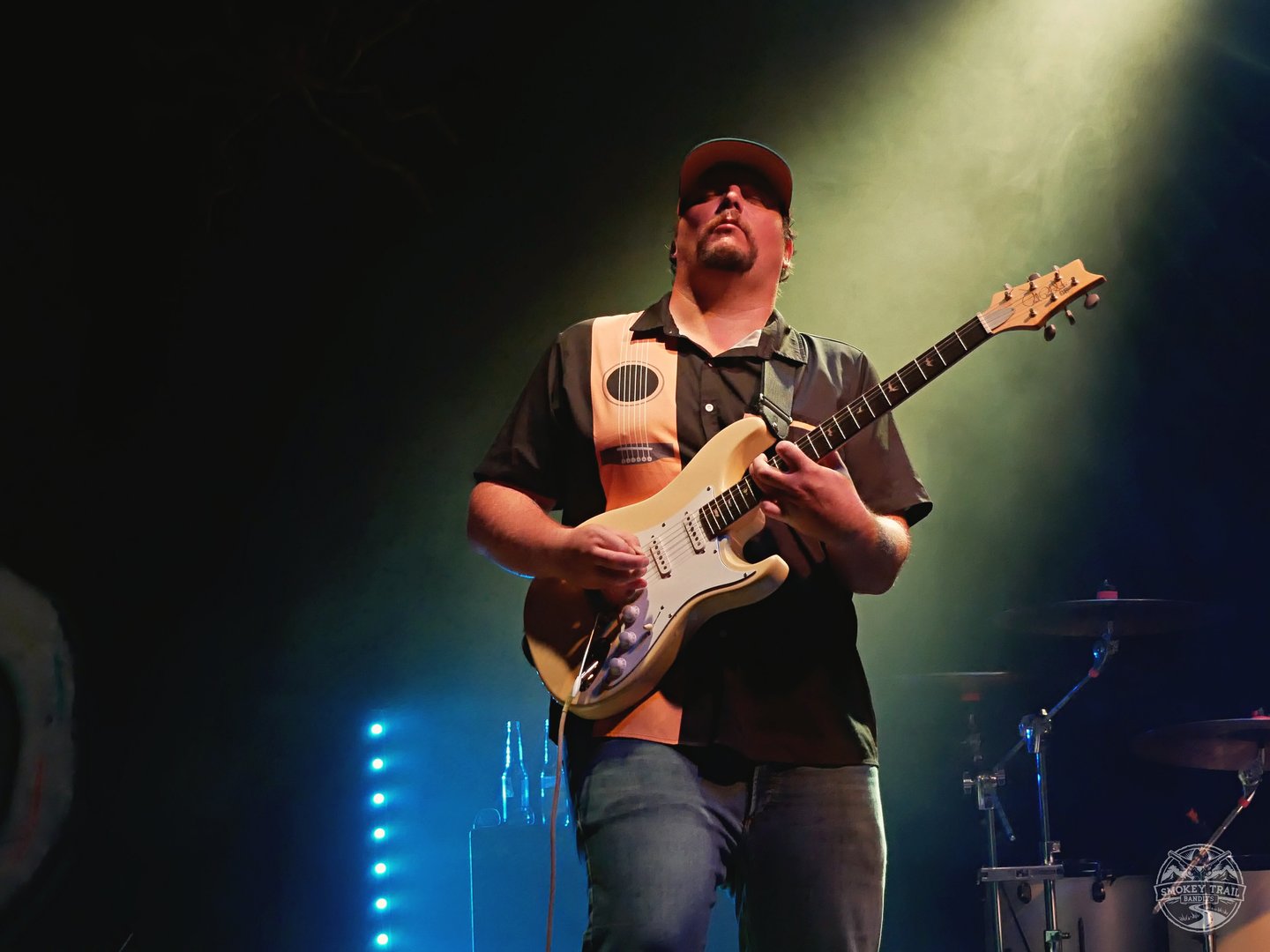 Tyler Boutin performing live on stage with electric guitar