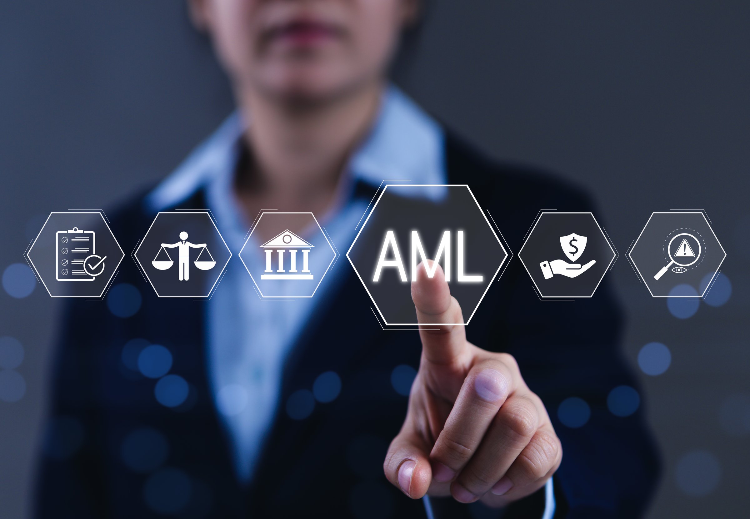 AML, Anti Money Laundering and Financial Compliance. Business professional interacts with AML interface icon for regulations, banking, protection, legal compliance in an anti-money laundering concept,