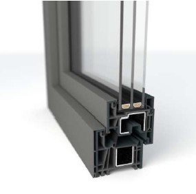 Close-up of a triple-glazed window cross-section, showing insulating layers and metal frame components.