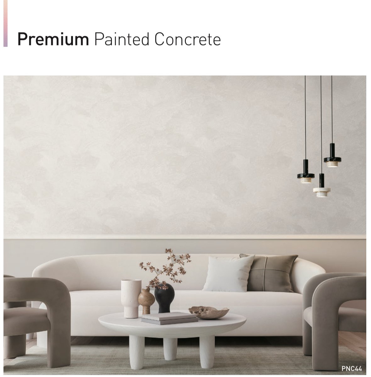 Minimalist living room with white sofa, abstract wall art, modern pendant lights, round coffee table, and neutral decor.