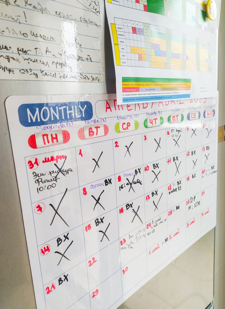 A chaotic calendar showing a busy schedule. Captures planning, deadlines, appointments, time management, and organization. Use for concepts of productivity, scheduling, or business.