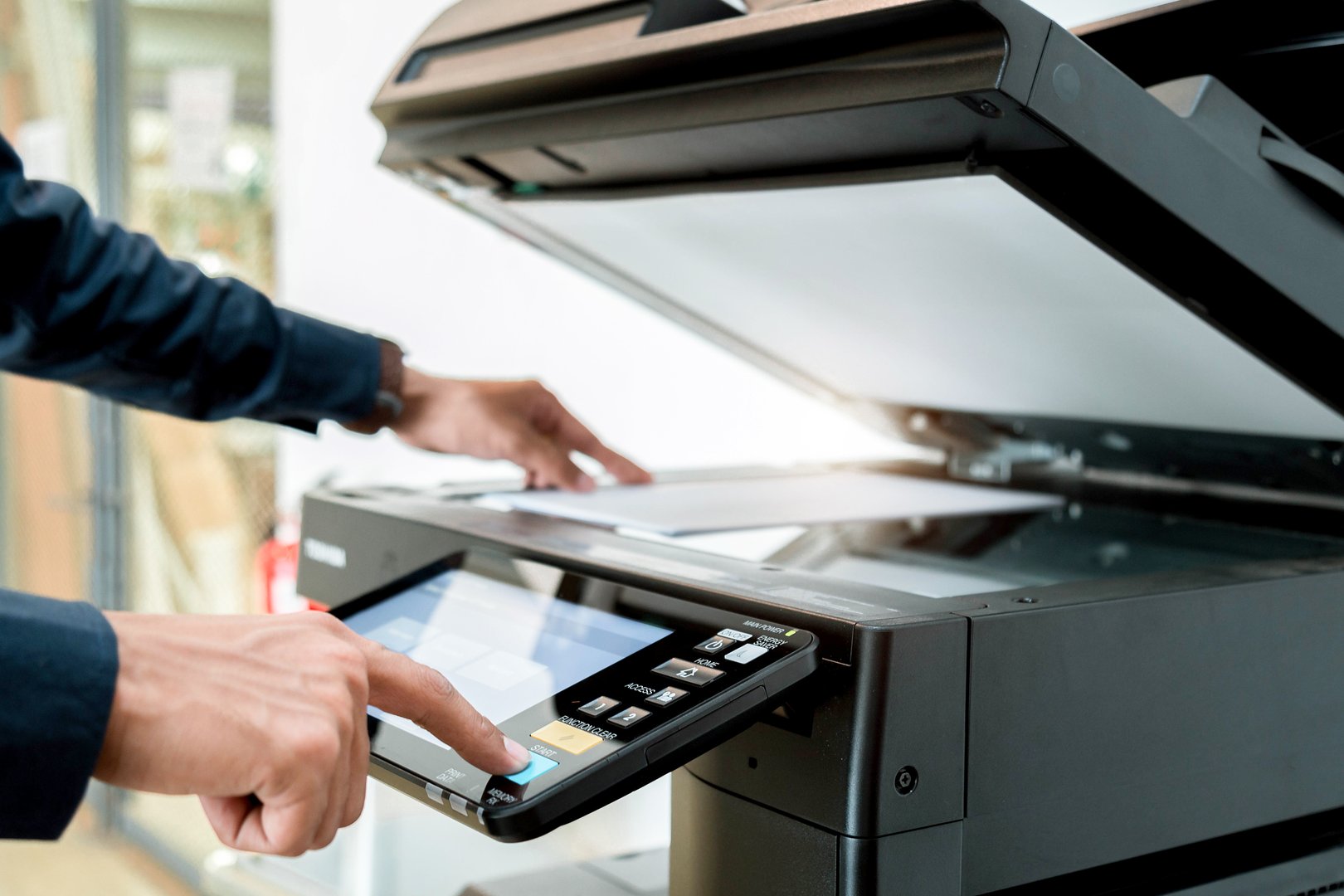 Hand use copier or photocopier or photocopy machine office equipment workplace for scanner or scanning document or printer for printing paperwork hard copy duplicate Xerox service maintenance repair.