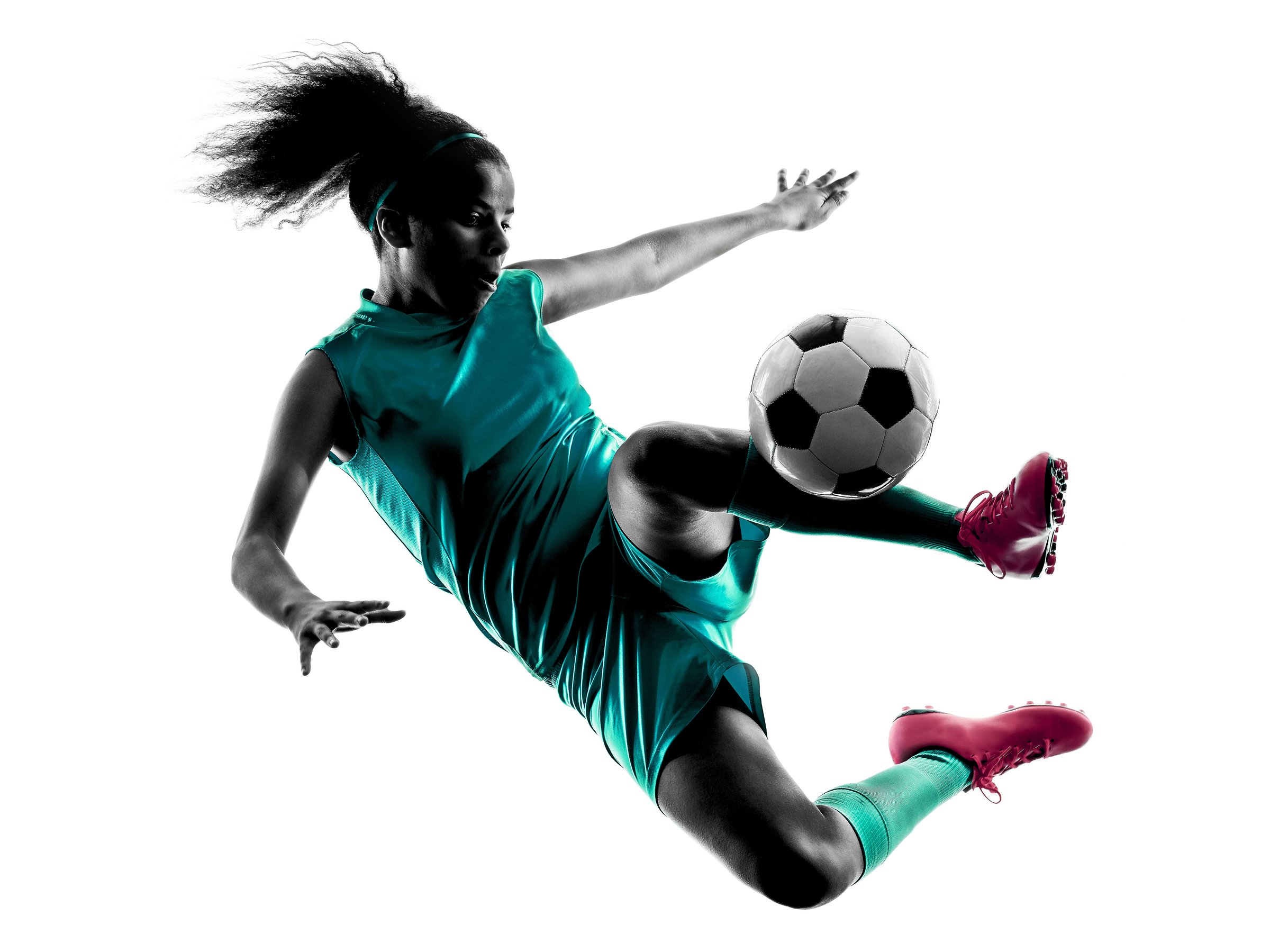 one teenager girl child  playing soccer player in silhouette isolated on white background
