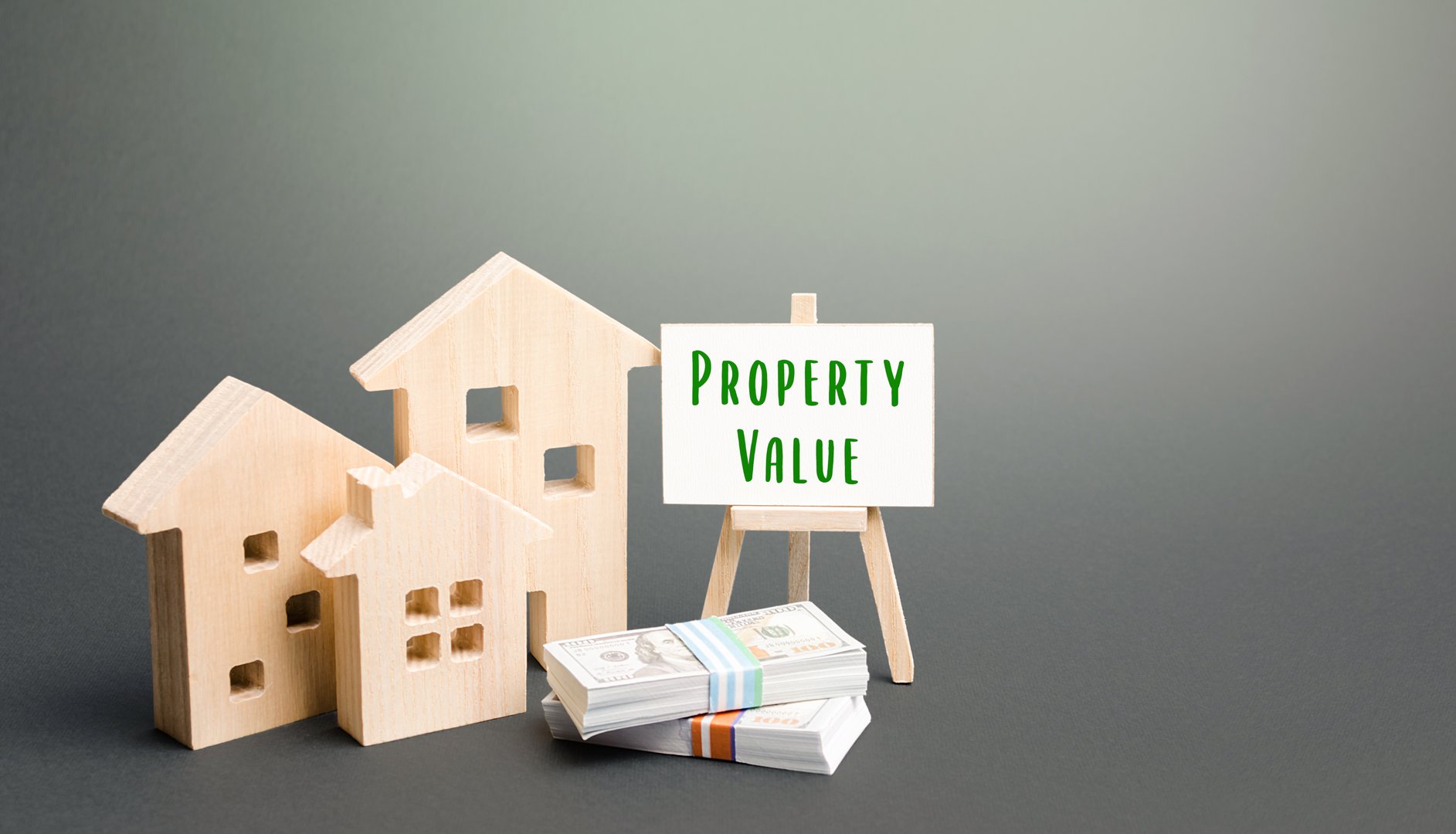 Residential houses and property value easel. Price trend in real estate market. Favorable purchase or sale of housing. Pricing from a variety of criteria and qualities. Profitable proposition