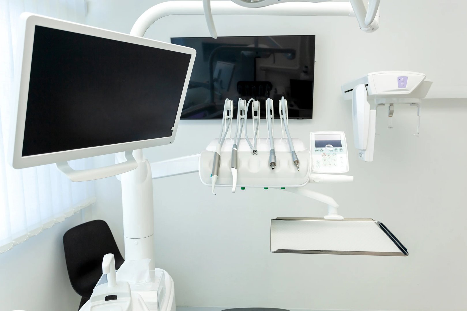 Contemporary dental clinic showcasing advanced equipment, technology, and a sterile environment, ready for patient care