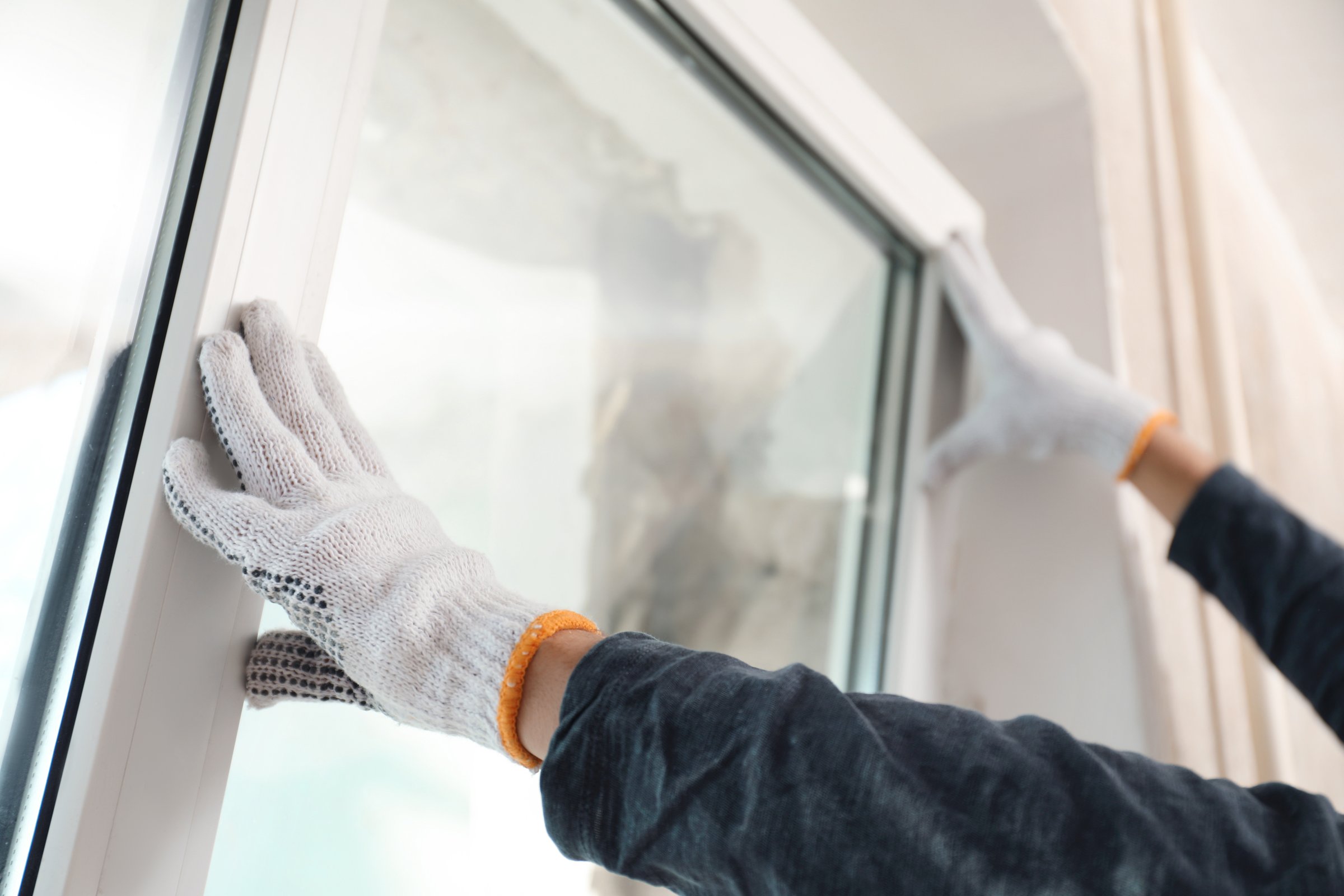 Window Installation. Man Installing New Windows.