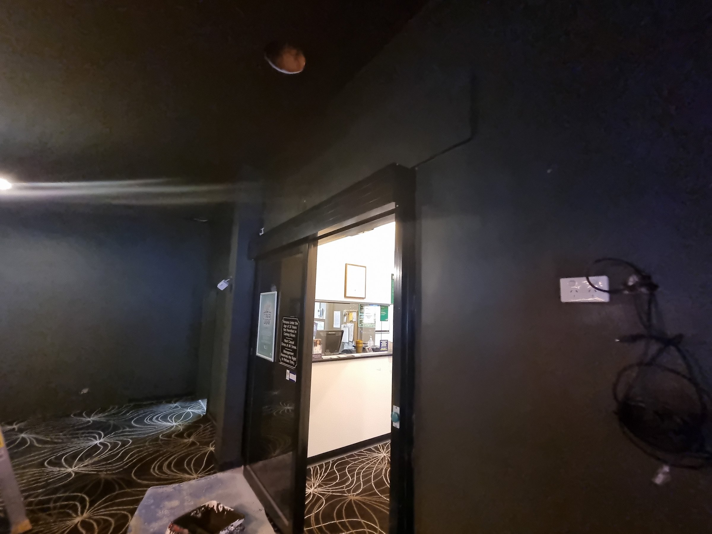 Completed Lorne Hotel wallpaper removal project showing professionally finished walls