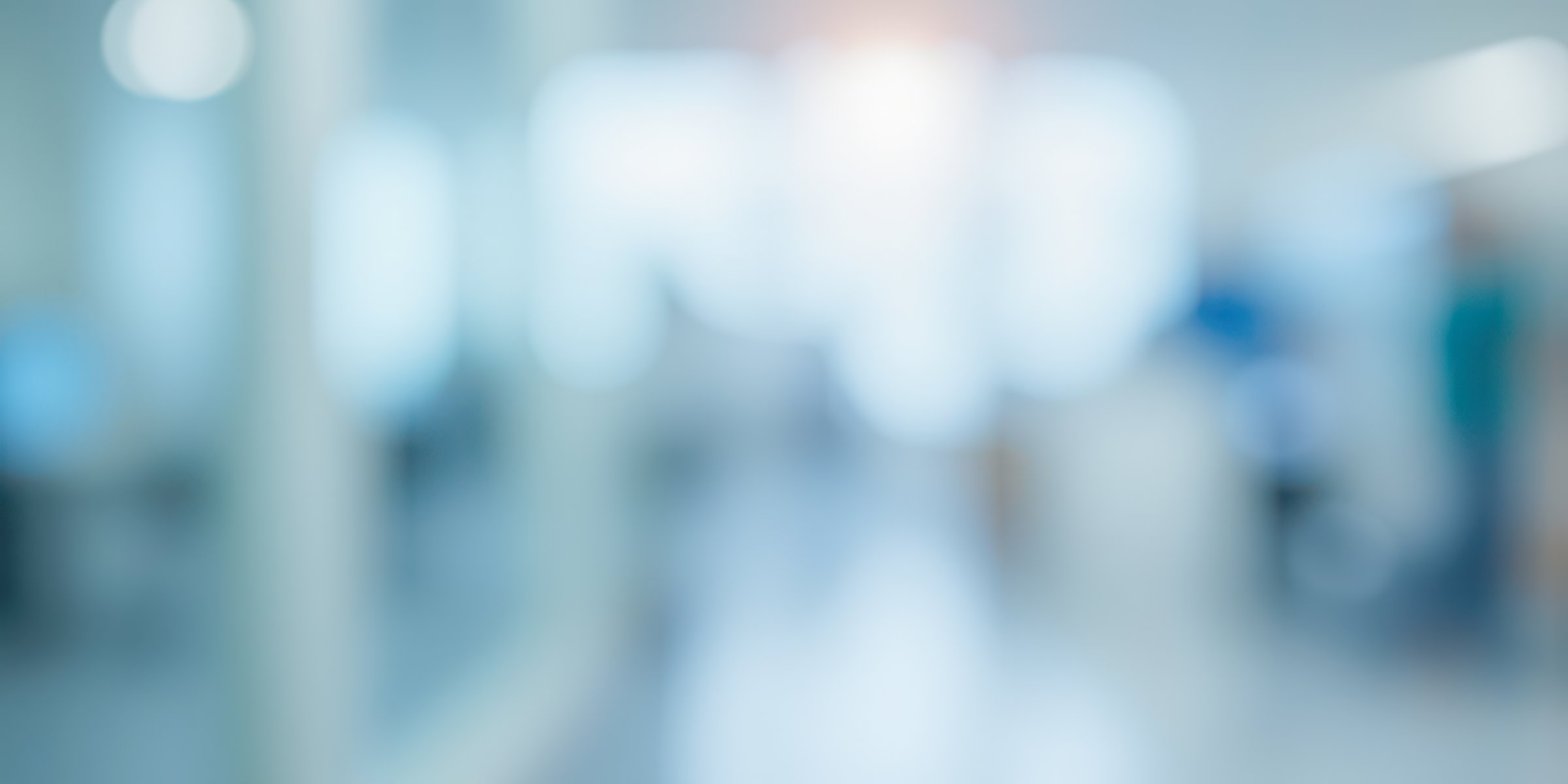 Defocused image of modern doctor's office or laboratory with sunny window, this clean backdrop is ideal for professional medical or science presentations