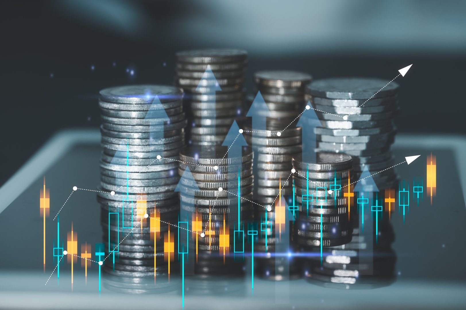 interests rate and trading opportunity in financial and investment concept, stack of silver and gold coins with trading chart in financial concepts and financial investment business stock growth