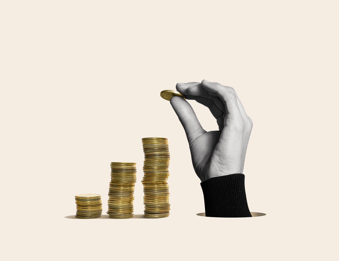 A hand makes stacks of coins. Art collage.