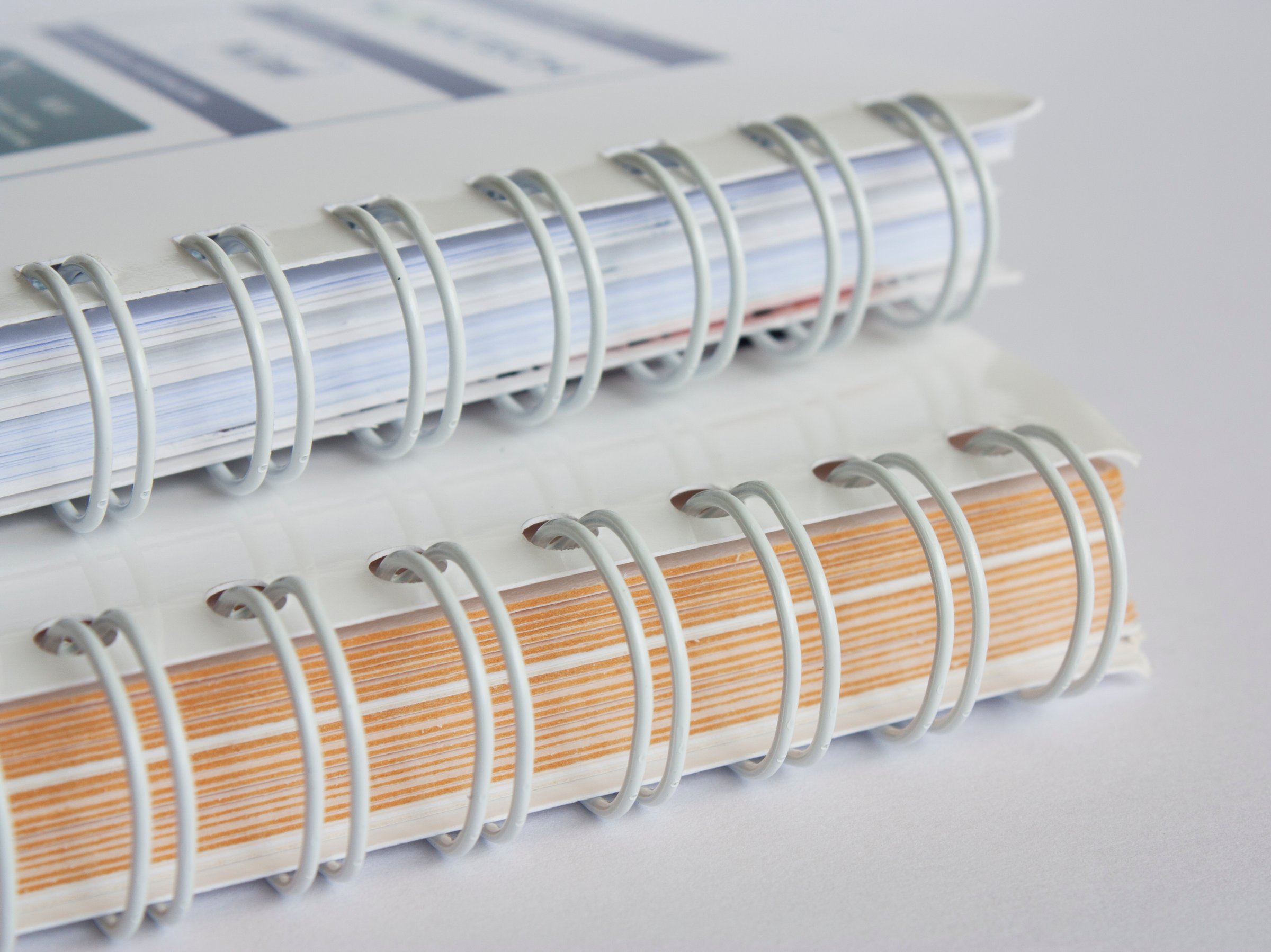 A close up of a wiro binding booklet