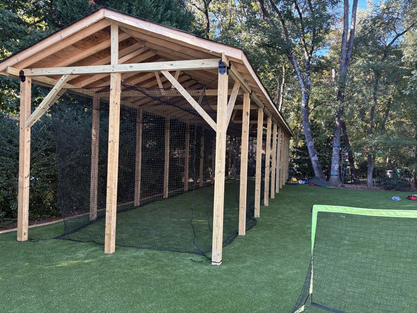 Backyard turf and batting cage