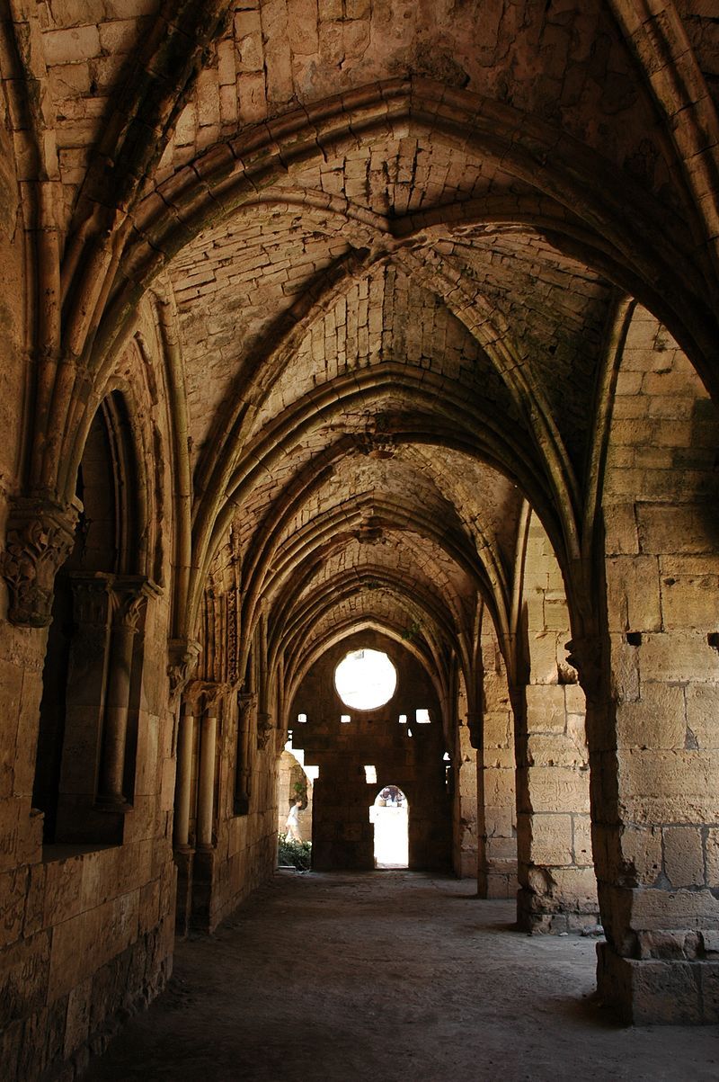 A panoramic view of Krak des Chevaliers castle, a medieval fortress on a hilltop in Syria
