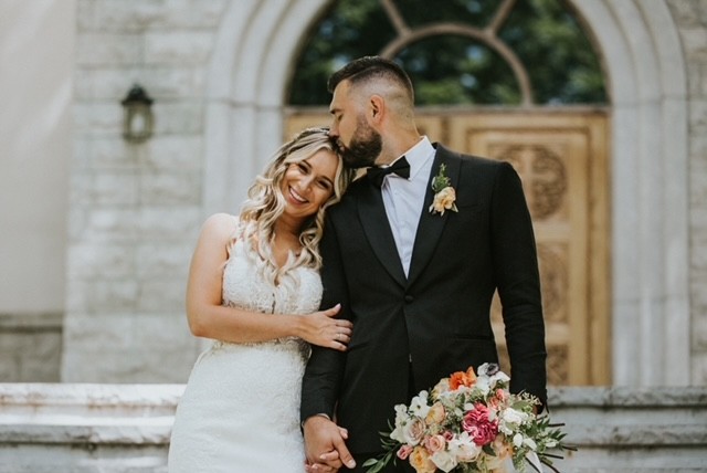 Beautiful wedding couple celebrating at Veslo Wedding Venue