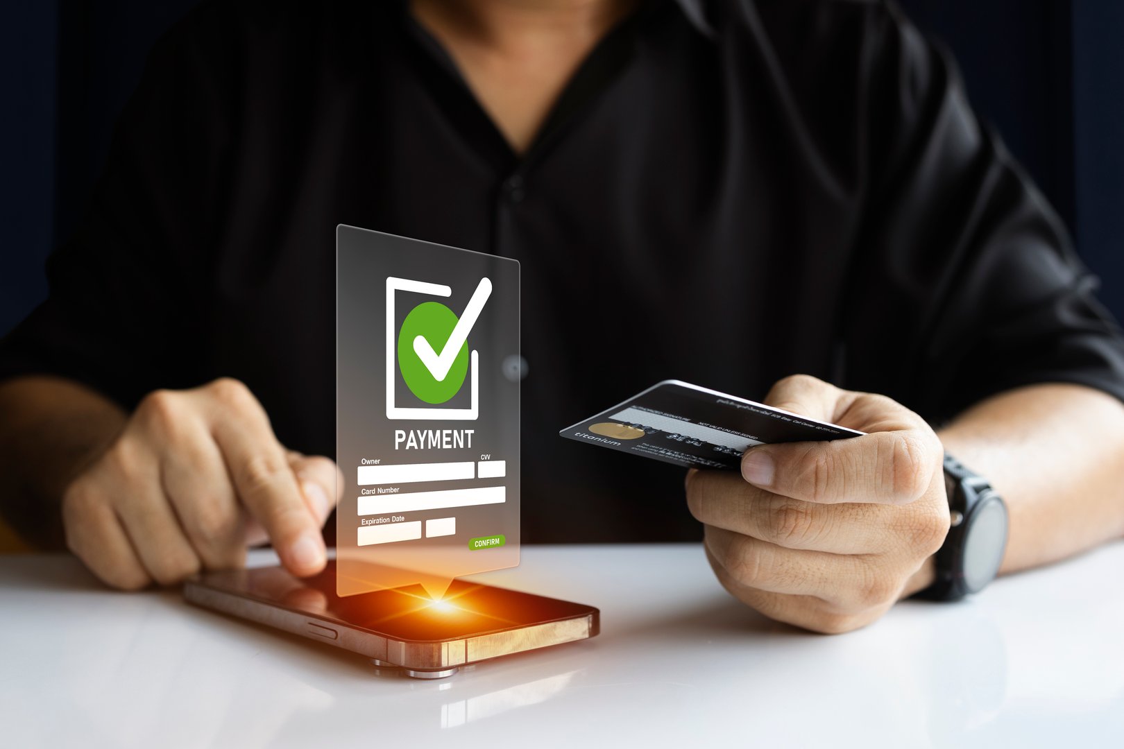Closeup of online payment using credit card and laptop with checkout form and cart icons, concept of secure digital shopping and ecommerce.