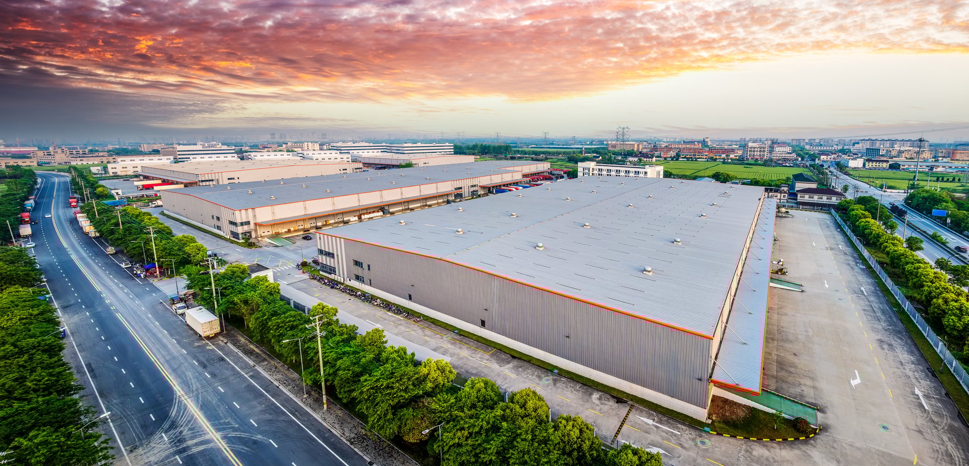 Modern enterprise factory warehouse landscape on sunny day