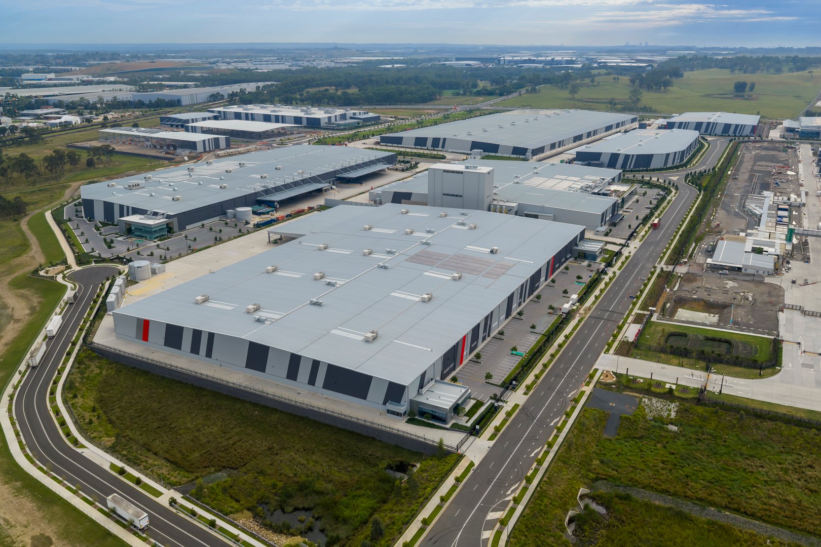 Aerial drone view of commercial industrial buildings