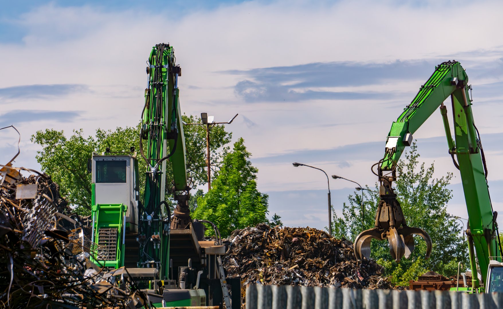 Scrapyard with material handling machines