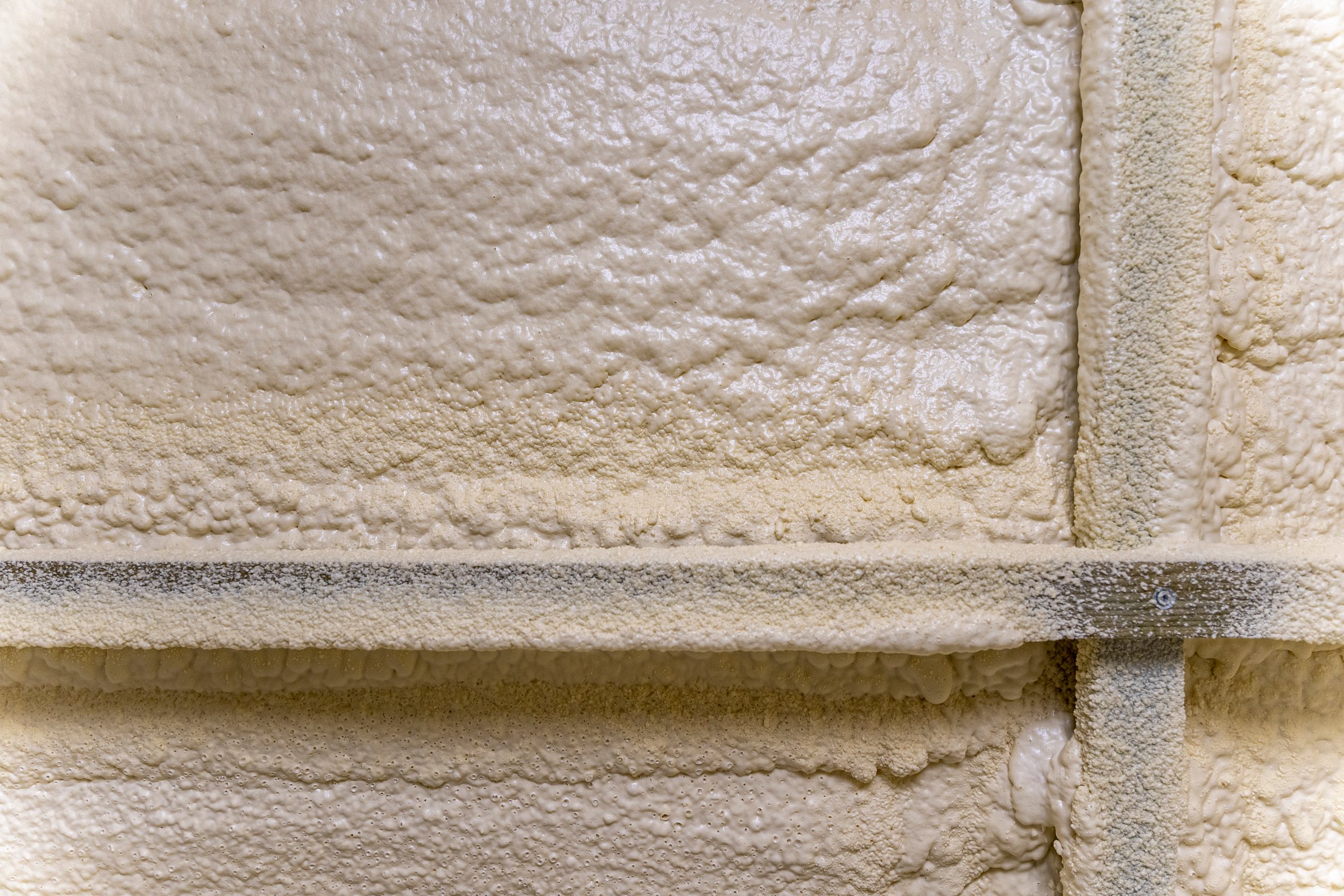 Close-up of the walls of the building insulated with polyurethane foam