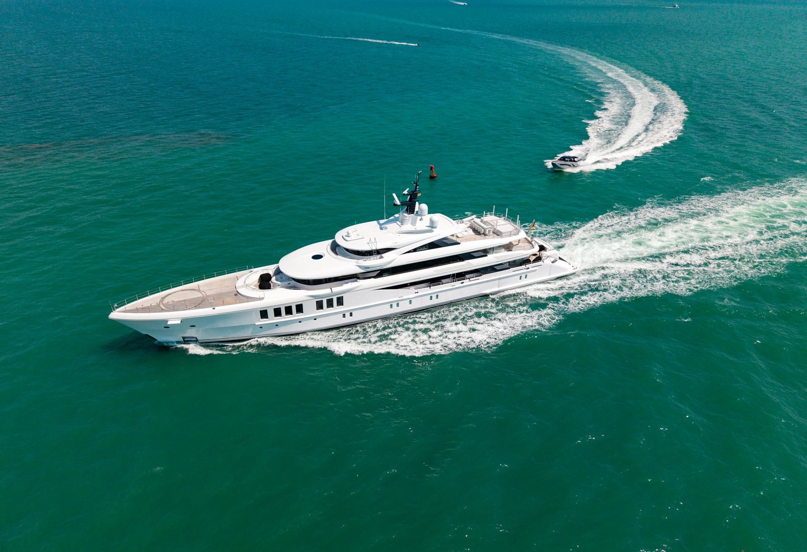 Yacht go to marina. Boating and yachting. Luxury lifestyle. Marina yacht club. Summer holiday. Yacht luxury view at sea. Vacation on summer. Summertime motorboat tour. Luxury motor boat yacht.