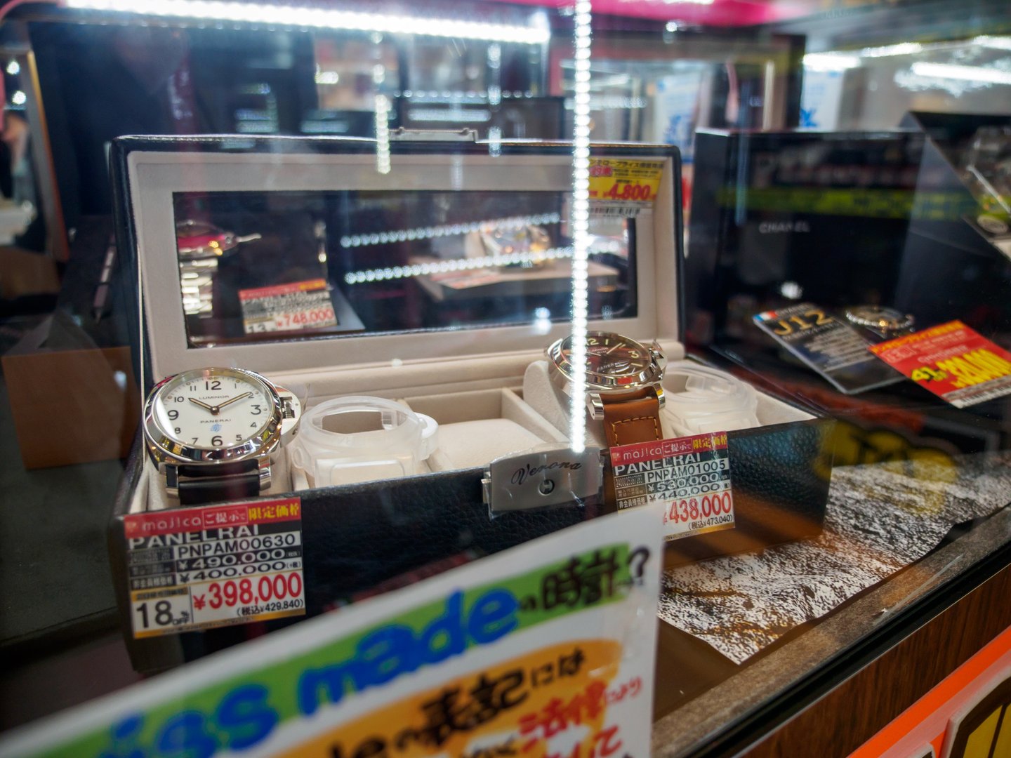 April 10, 2018. Close-up of a glass counter with multiple Officine Panerai wristwatches on display at the tax free retailer Don Quijote. Kyoto, Japan. Travel and luxury watch industry editorial.