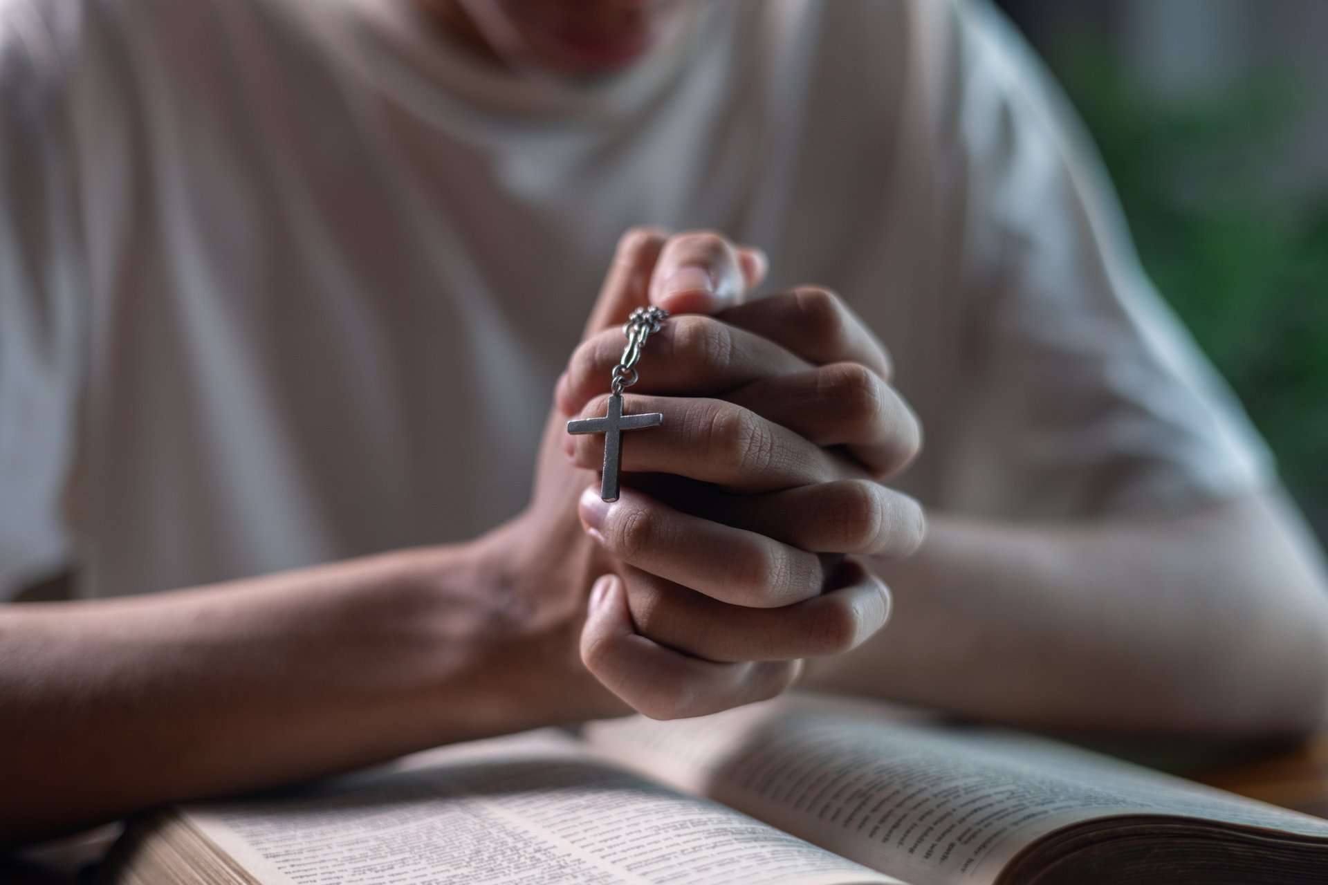 Man is faith in God and belief in Jesus Christ were strengthened through daily prayer and worship, as he found hope and guidance in Bible and his religion. grace, meditation, reading, devotion, group.