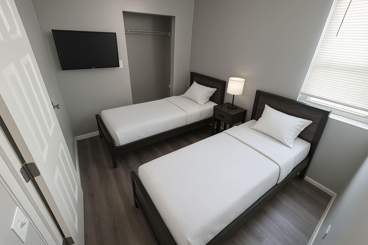 Shared bedroom with nightstand and TV