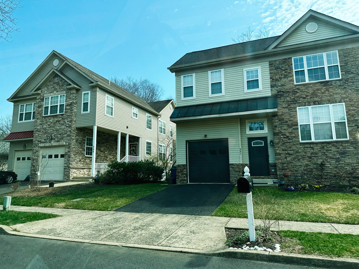 Jenkintown, Pennsylvania, USA - April 01, 2025: Two family homes with stone details and modern architecture in New Jersey town.
