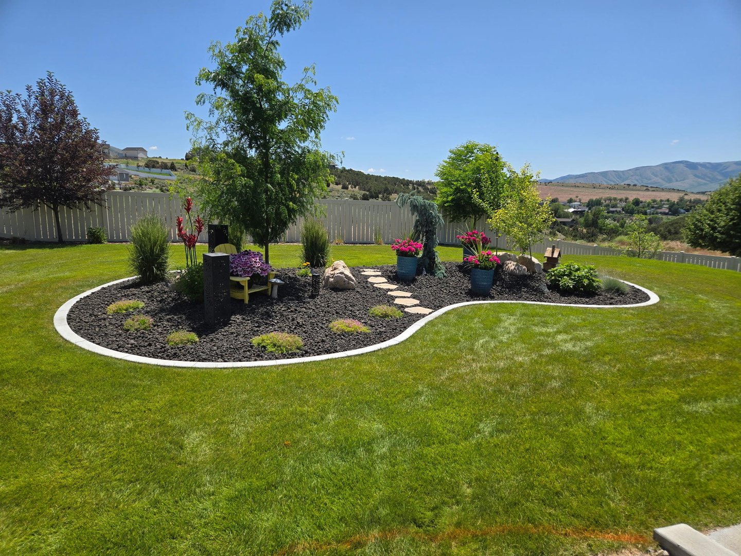 Creative Edge Curbing rock and barrier installation