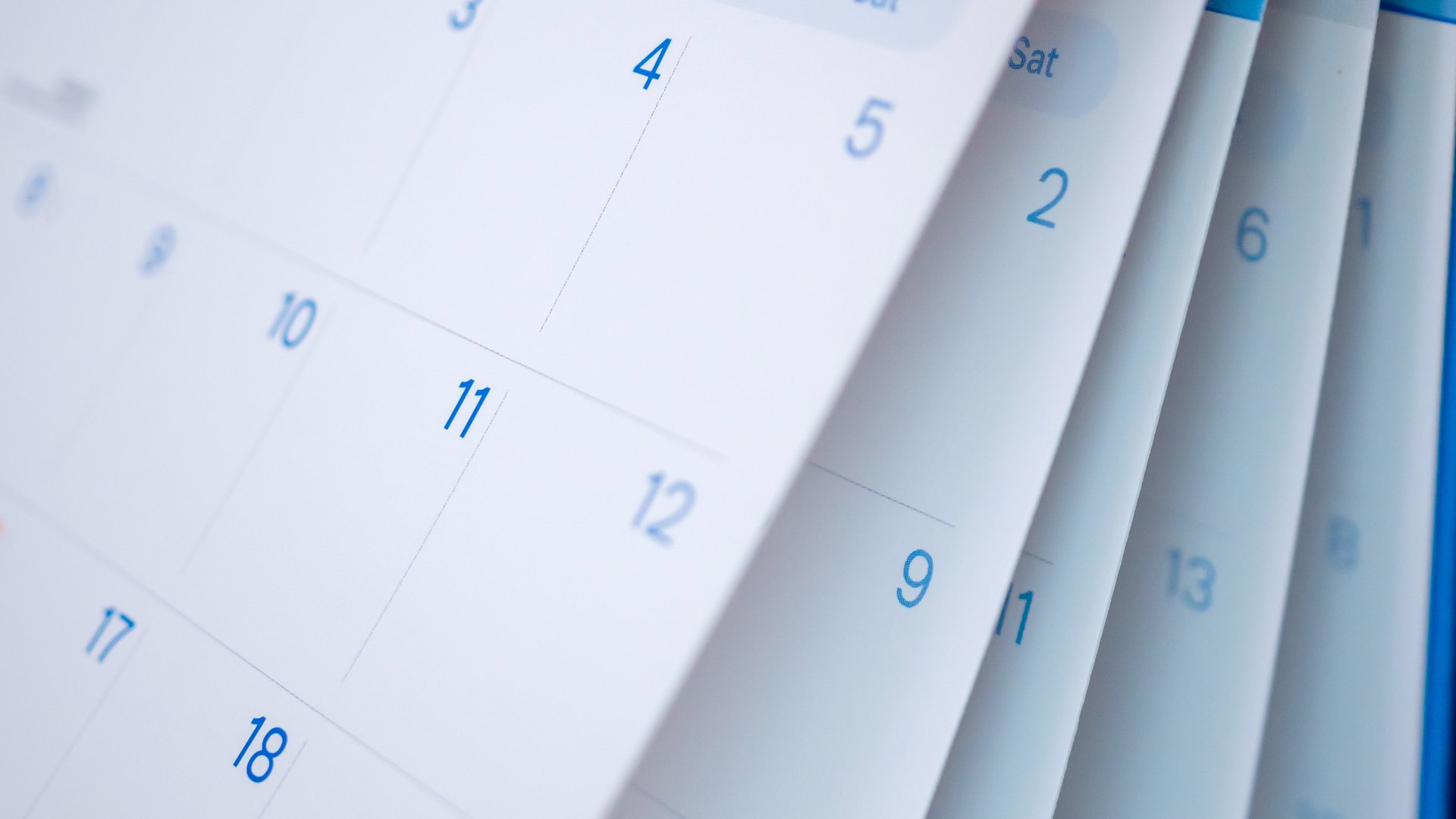 Abstract blur calendar page flipping sheet close up background business schedule planning appointment meeting concept