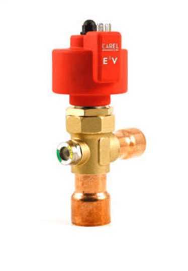 Red and brass solenoid valve with copper fittings, used in refrigeration or HVAC systems.