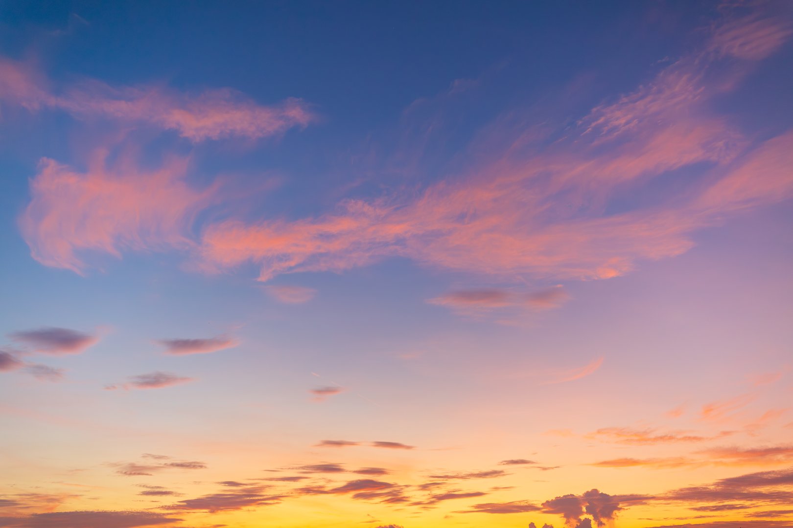Colorful morning sky and clouds backdrop, Beautiful Vivid sky painted by the sun leaving bright golden shades