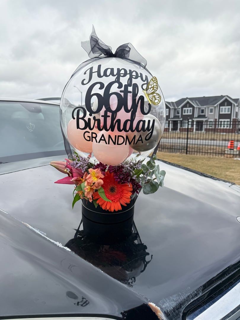 Hot air balloon with flowers in decorative box