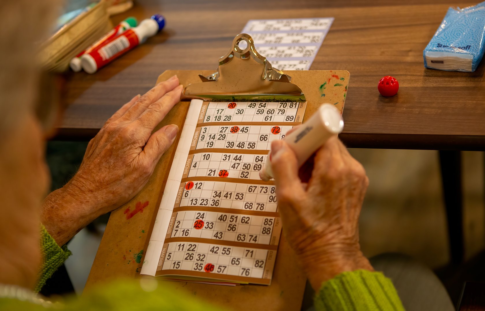 Adults playing bingo