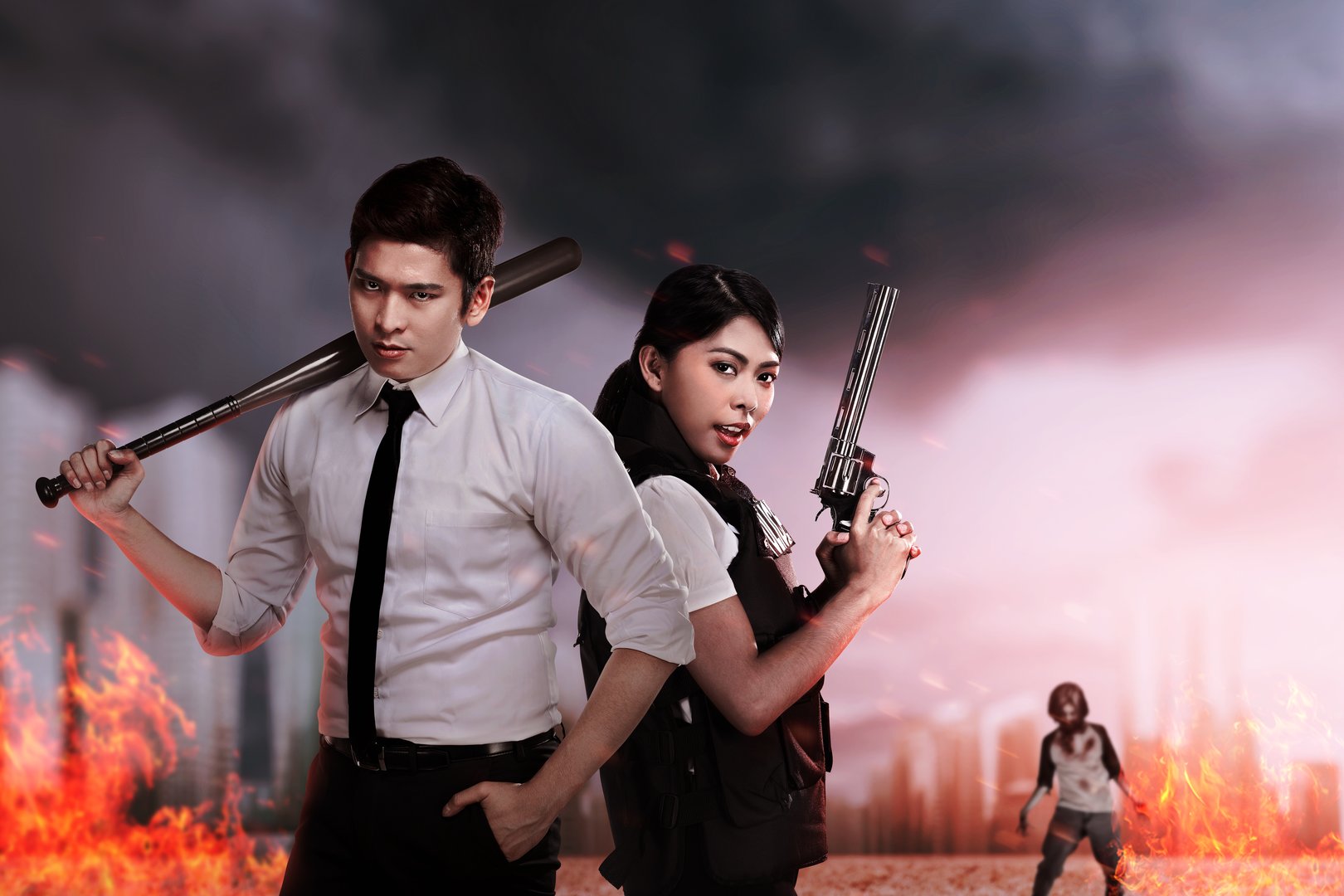 Asian people in police vest standing with a baseball bat and gun with zombies on the background