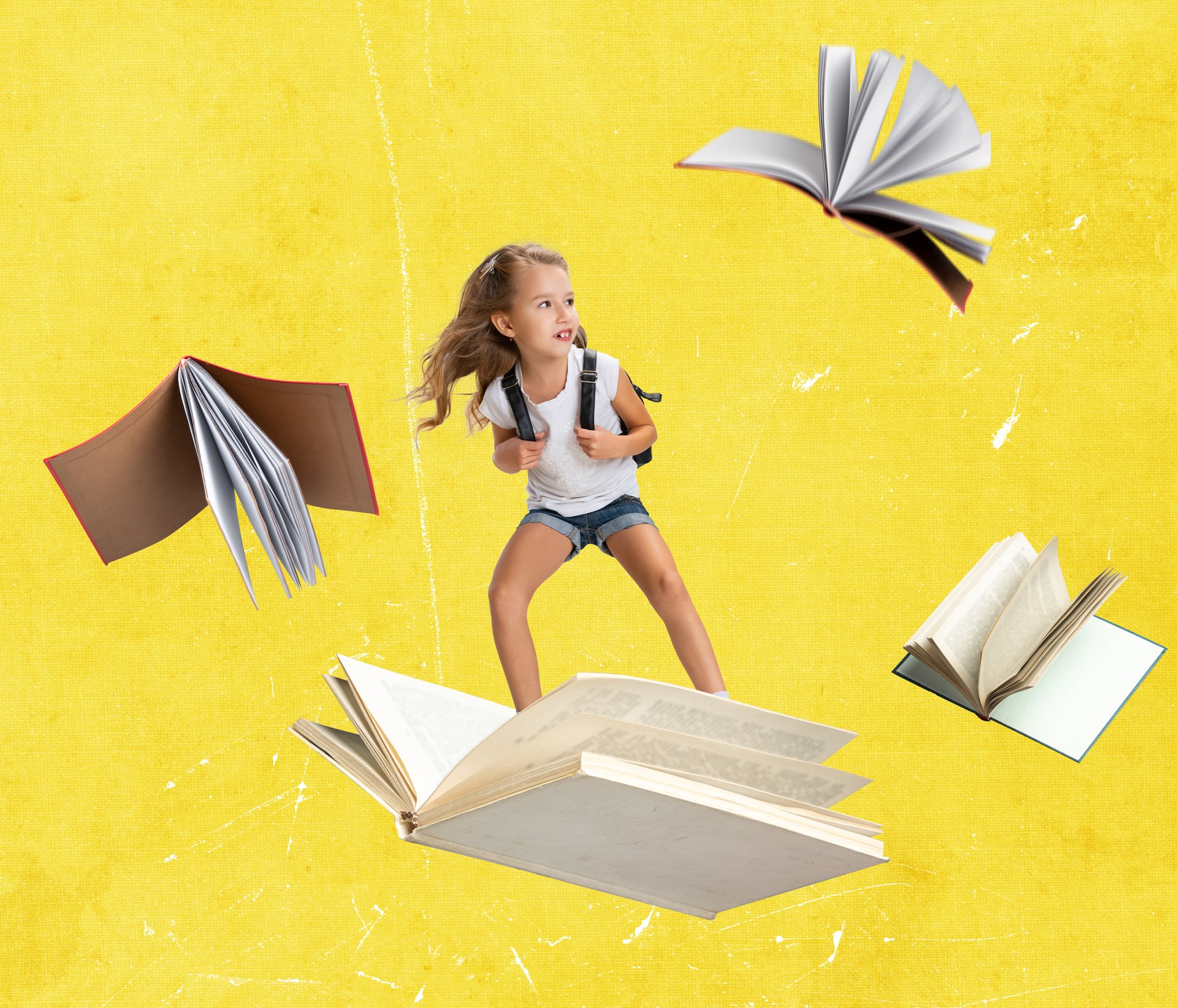 School preparation. Contemporary art collage of child, girl flying, surfing on open book isolated over yellow background. Concept of education, childhood, discovery, artwork, inspiration and ad