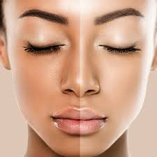 Close-up of a woman's face showing a comparison between two skin tones, with eyes closed and lips slightly parted.