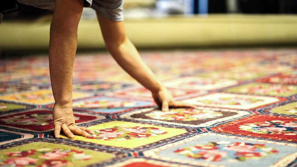 Post detailing and inspection of cleaned rug