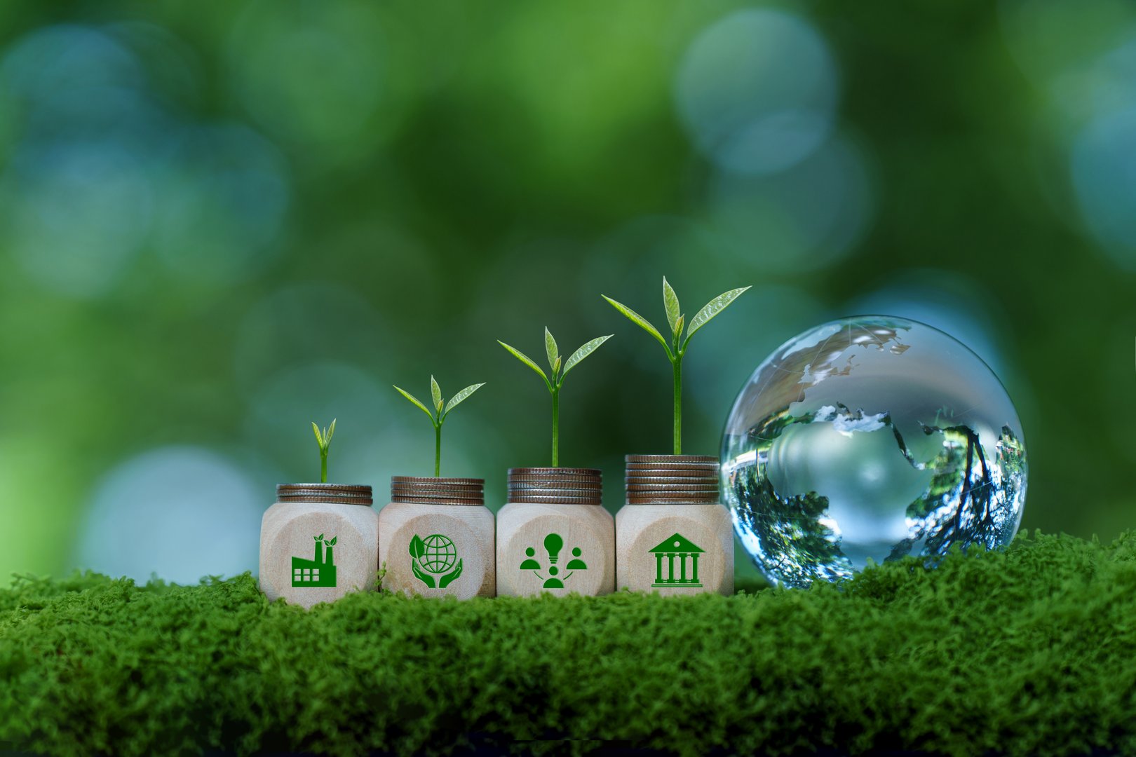 ESG environment social governance investment business concept. ESG icons on woodblock with small tree on stack coins and crytal globe earth. sustainable organizational development. Eco-friendly. CSR.
