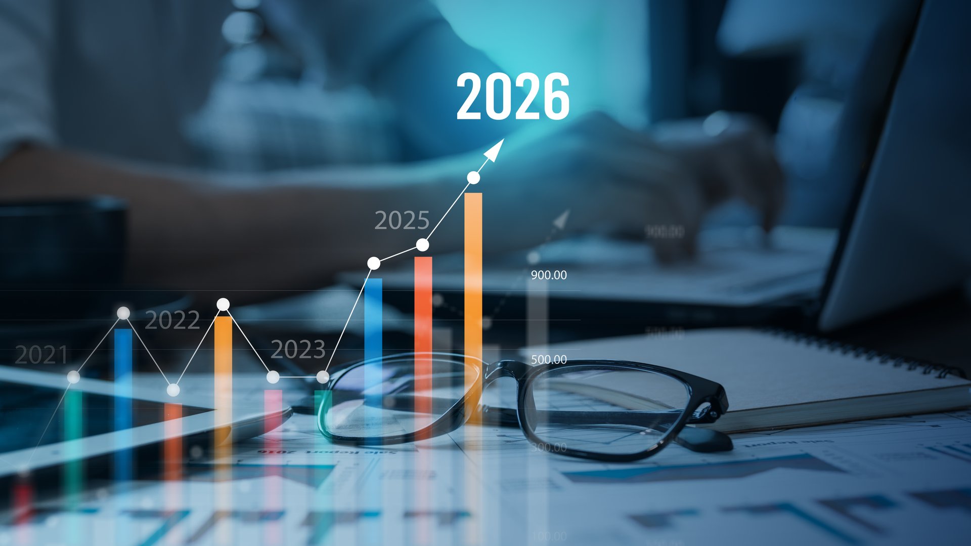 A business growth forecast showing rising charts from 2021 to 2026