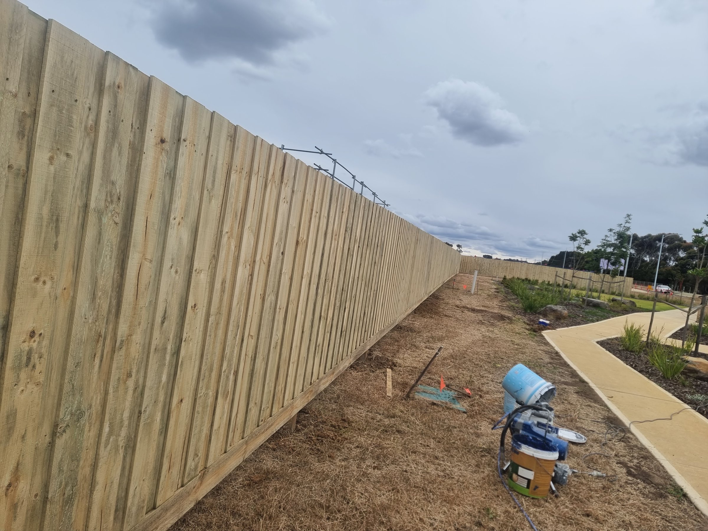 Quality Painting Group fence project before restoration - weathered timber condition from November 2023