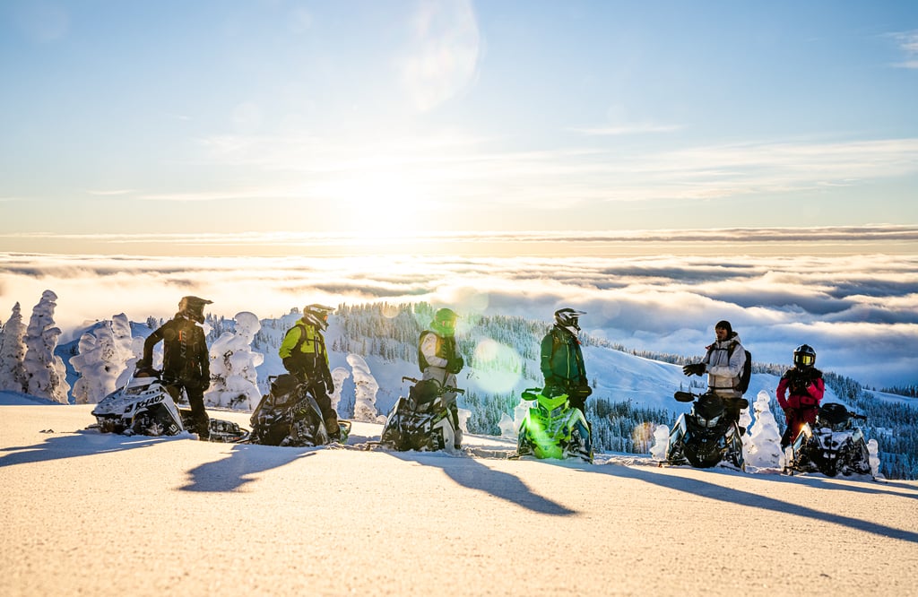 Snowmobile adventure in mountains