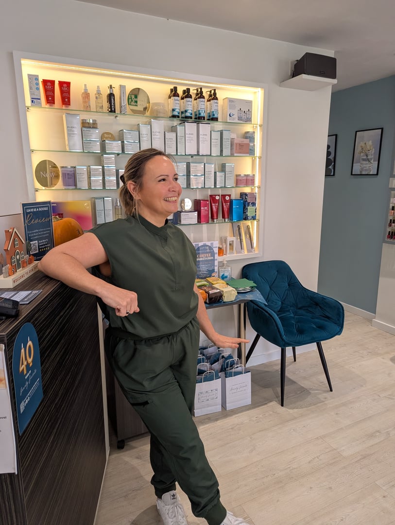 Sarah performing aesthetic treatment in clinic