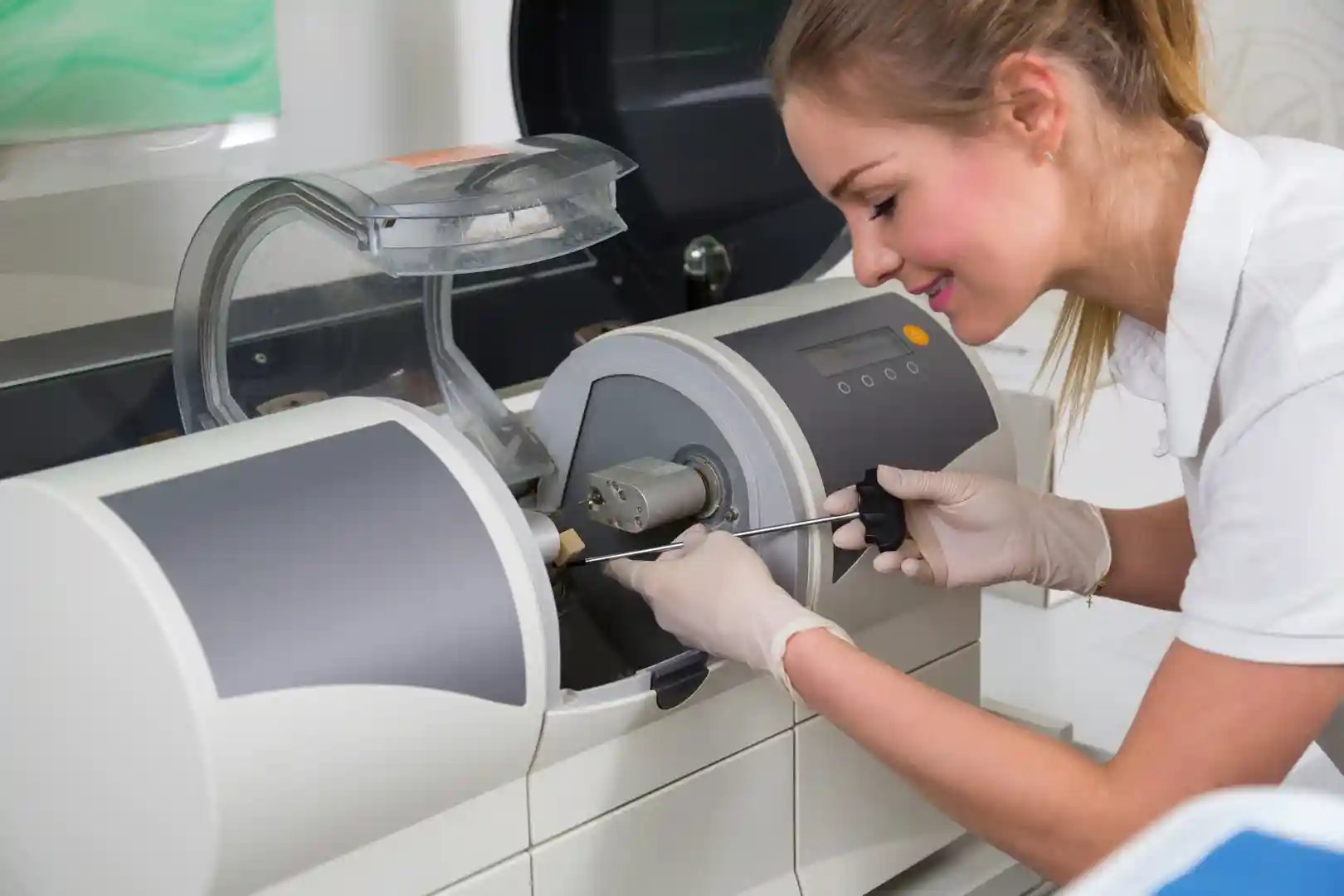 CEREC CAD/CAM milling machine creating same-day dental crowns, inlays, and onlays - advanced chairside economical restoration technology for precision ceramic restorations, metal-free crowns, and digital dentistry at Murwillumbah Dental practice