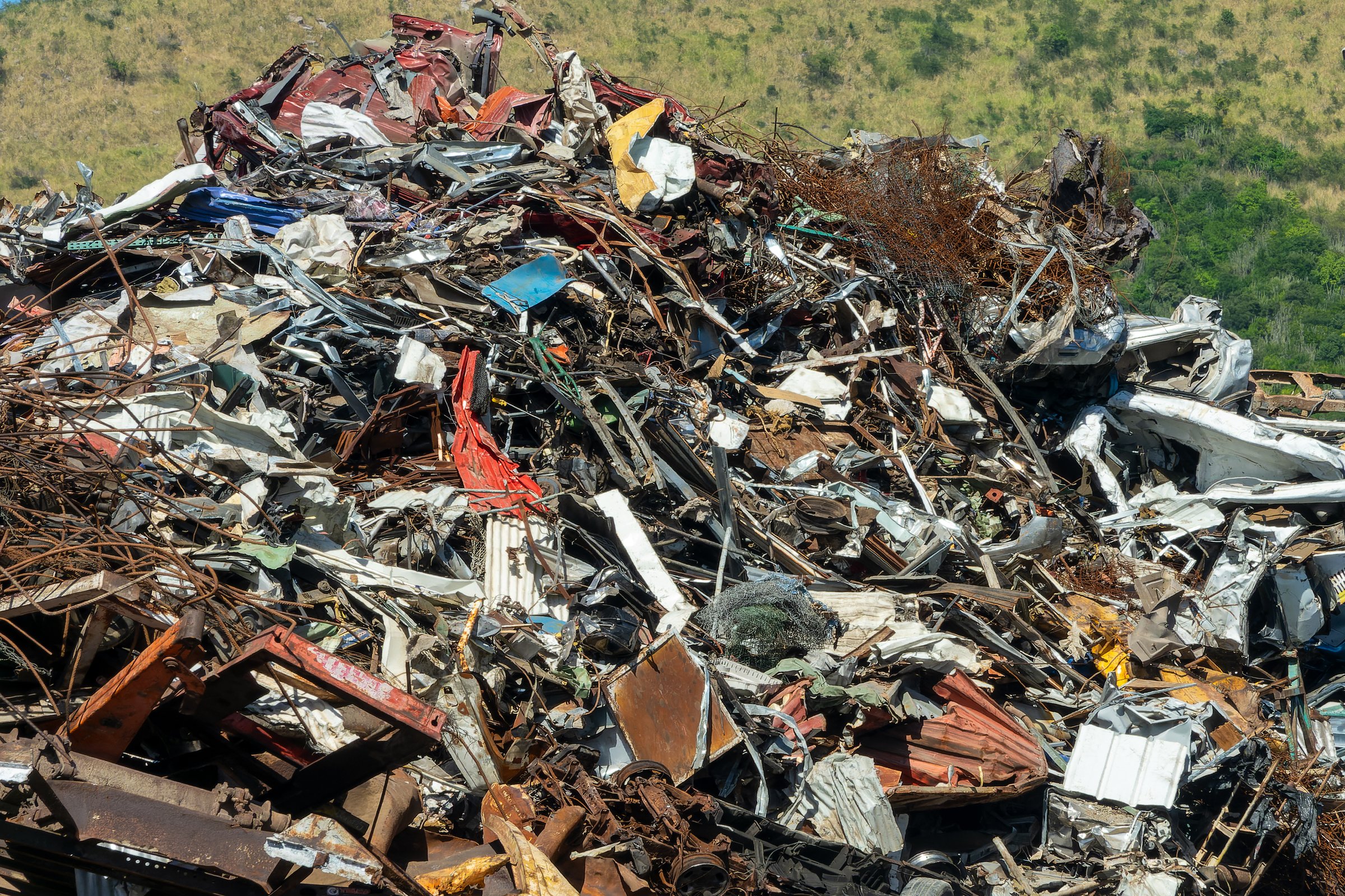 Large pile of scrap metal in a rubbish dump for recycling