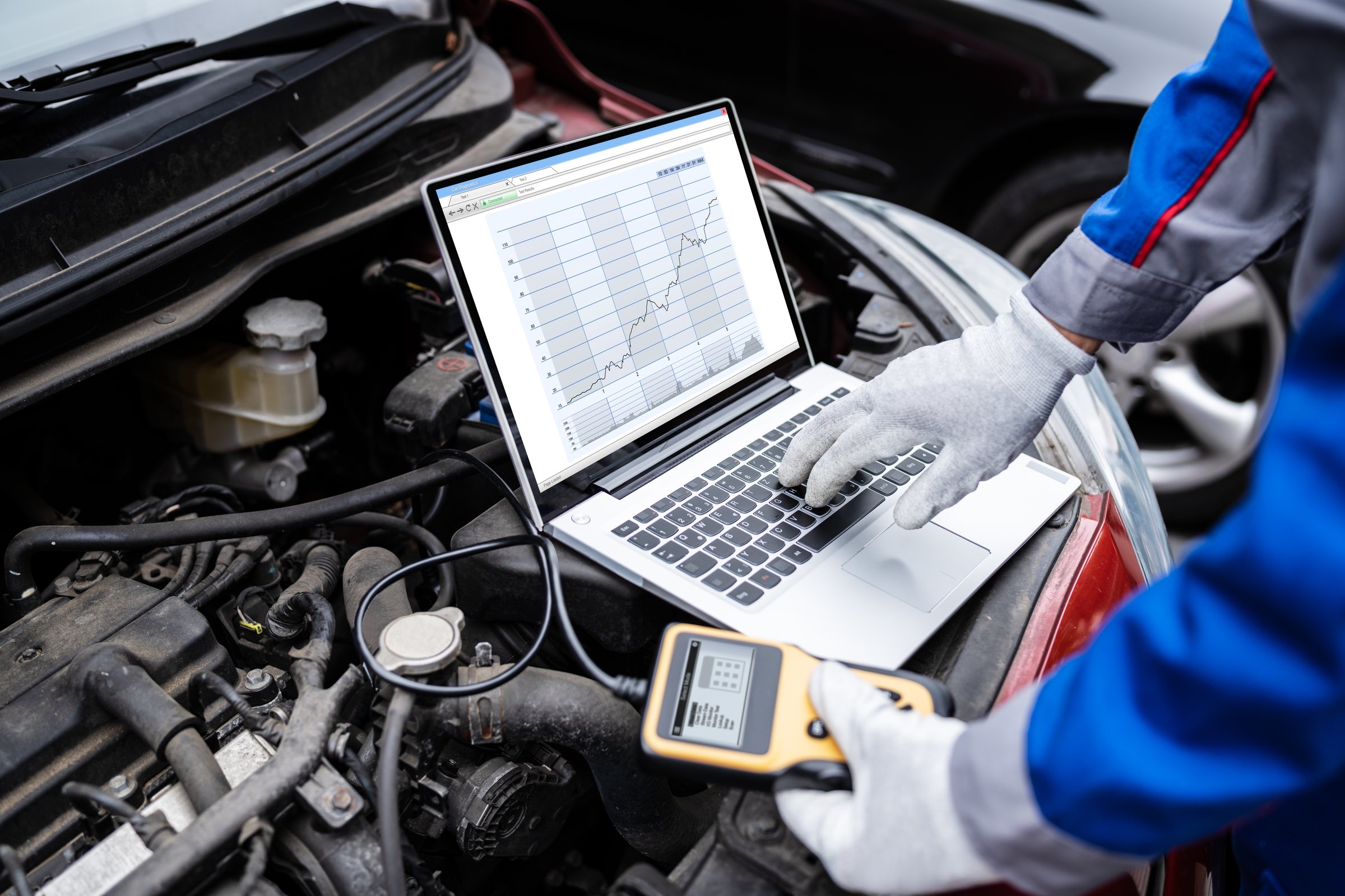 Car Diagnostic Service And Electronics Repair By Mechanic Worker