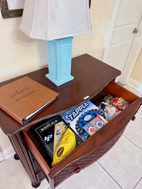 Games cabinet at Salt Life Villa