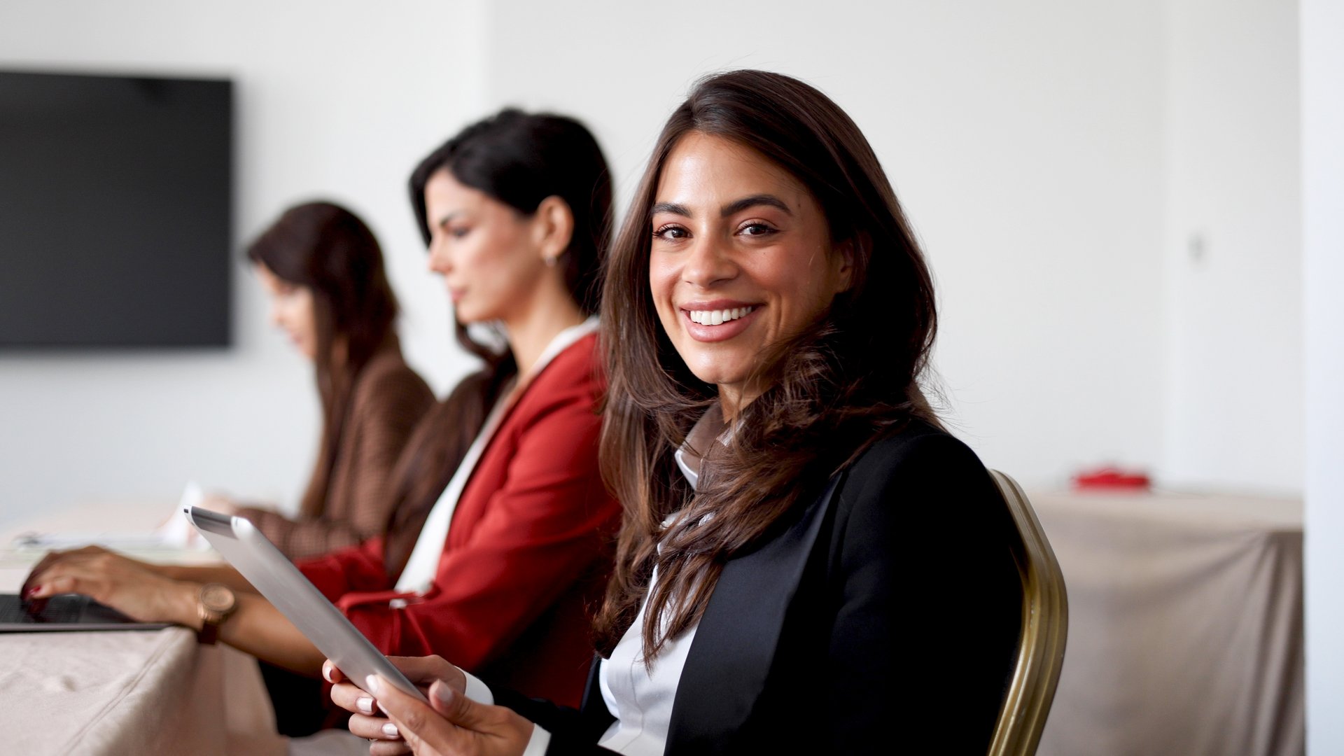 Three beautiful, young businesswomen