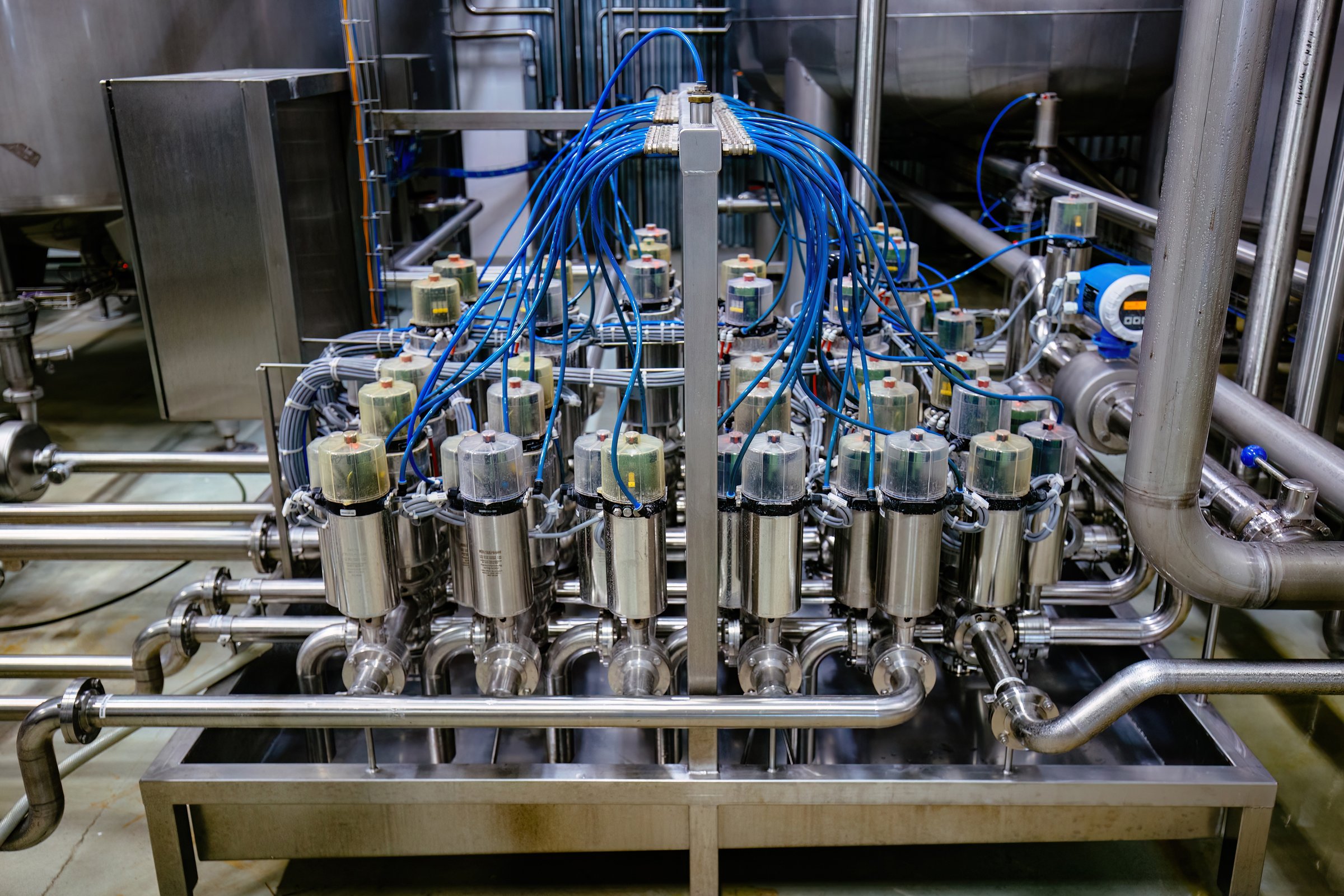 Matrix of mixproof separation valves in modern food or chemical factory.