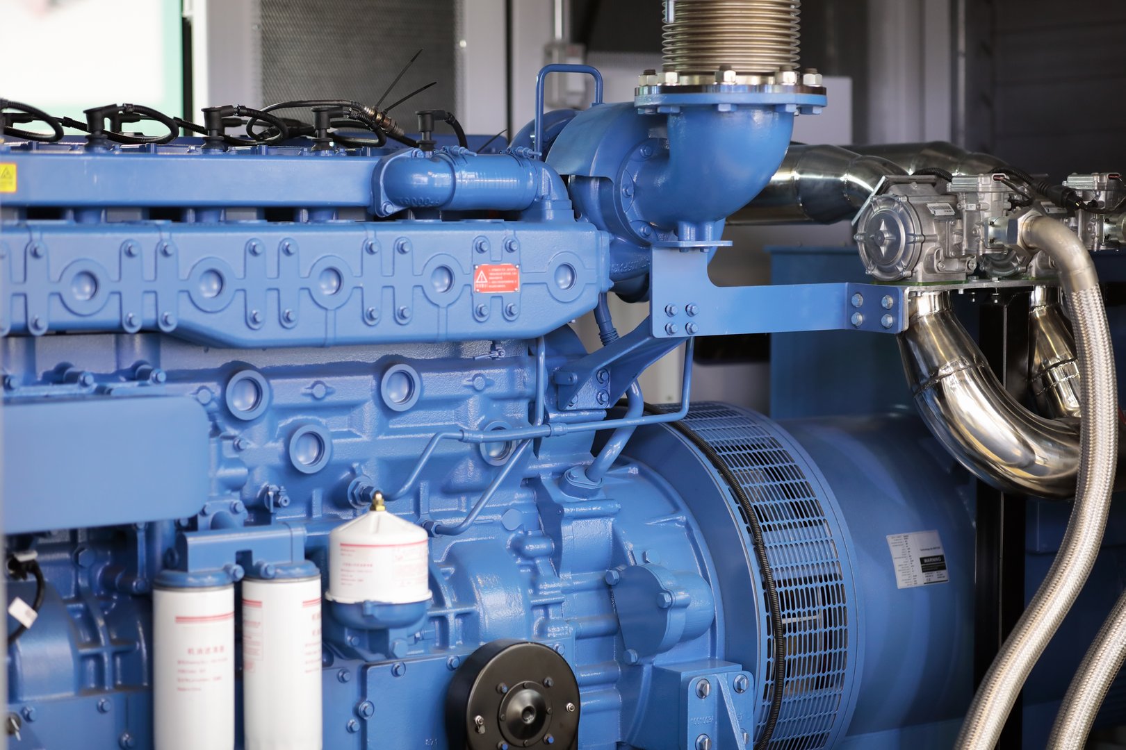 Containerized gas fired electric power generator close up. Selective focus.